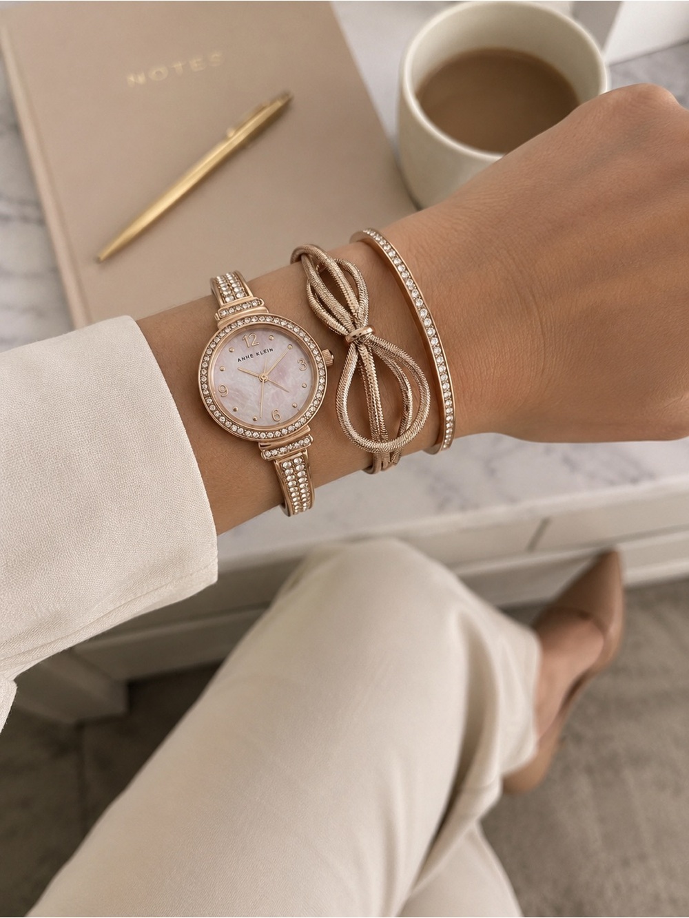 Rose gold watch and bracelets set